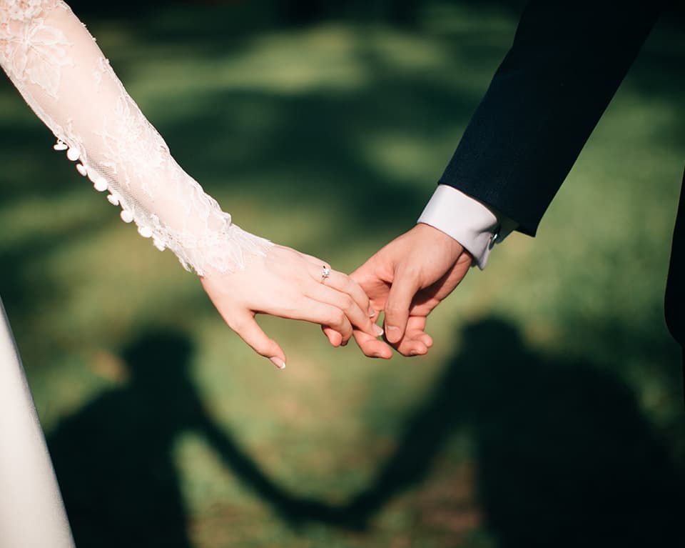 Bride & Groom Holding Hands